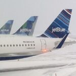 Micron rallies, JetBlue & other airlines face weather disruptions