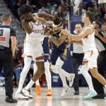 Astonishing moment 6ft NBA star Jose Alvarado punches 7-foot-1 Mark Williams before both players are ejected
