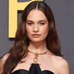 Lily James carries the nightwear-as-outerwear trend into 2026 in lace slip dress