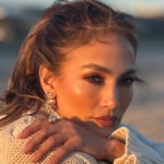 Jennifer Lopez Changes From a Skintight Dress to Striped Pajamas on Christmas Eve