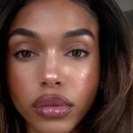 Lori Harvey’s Tiny Micro Shorts & Bikini Top Are a Floral Dream