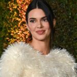 Kendall Jenner’s Dangerous Red Dress Pose Stops Scrolls