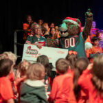 Chicago music teacher receives Classroom Legends award by combining education, Bears fight song to energize students