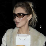 Bella Hadid Revisits the Y2K Aesthetic, in Lace-Up Jeans and a Baby Tee