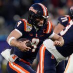 Luke Altmyer leads Illinois to a win in bowl game after running over an official