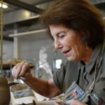 A Kansas City artist crafts fashion — and guns — out of ceramic. Her provocative career gets a new look | KCUR