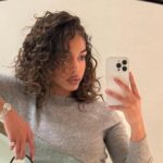 Lori Harvey’s Balenciaga Bag Gives Poolside Bikini Photo a Luxe Touch