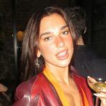 Dua Lipa Rings in 2026 With Callum Turner in a Jacket So Hot It Burns