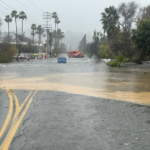 2 trapped in car by rising waters near Fashion Valley Mall rescued by lifeguards