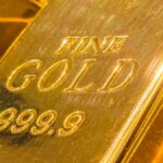 Gold holds above $5,000 as Trump’s blanket tariffs get struck down, Iran-US tensions in play