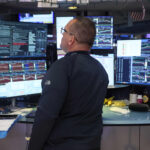 We’re buying 2 stocks in the beat-down financial sector, downgrading a name