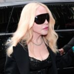 Madonna puts on a racy look for the Dolce & Gabbana show during Milan Fashion Week