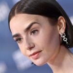 Lily Collins stuns in plunging coral crop top at New York Fashion Week