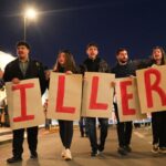 Protest held on Greek island against docked US aircraft carrier as Iran tension builds