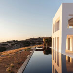monolithic ‘avlakia house’ overlooks island of antiparos, greece