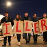 Protest held on Greek island against docked US aircraft carrier as Iran tension builds