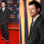Harry Styles makes fashion statement in Chanel pinstriped suit, ballet flats at 2026 BRIT Awards