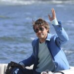 Brad Pitt soaks up the sun on a boat in Greece as he continues to film his new drama The Riders