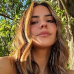 Bad Bunny’s girlfriend Gabriela Berlingeri wears one of fashion’s most divisive shoe trends on their latest trip together