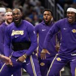LeBron passes to Bronny for a 3-pointer and the NBA’s first father-son assist, league says