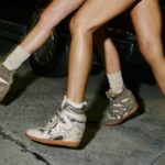 Brace yourself – wedge sneakers are back on the scene