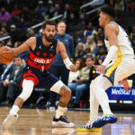 Wizards star Trae Young leaves loss to Warriors early with quad injury