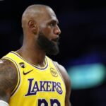 James breaks NBA appearance record as Lakers win thriller