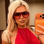 Tallia Storm Paints the Town Red in Fashion-Forward Halter Gown