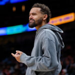 Trae Young ejected after coming onto court during incident in Wizards’ loss to Rockets, days before his debut