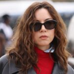 Aubrey Plaza Goes Pantsless in an Edgy Leather Jacket at Paris Fashion Week