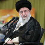 The Photo That Shook Greece: The Former Minister and the Khamenei Portrait