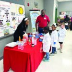 Vibe Tribe: Henkel helps students at Isenberg with science experiments