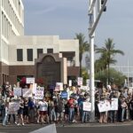 More than a 1,000 Arizonans stood outside upscale Scottsdale Fashion Square for another Valley protest against Trump—chants and signs along roadway