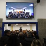 Rail disaster trial begins in chaotic fashion