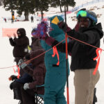 Nonprofit celebrates start of Paralympic Games with adaptive ski day
