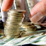 Pound set for biggest monthly loss against dollar since October