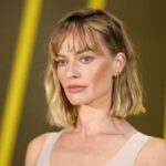 Margot Robbie’s Sheer Top Style Makes a Splash at Paris Fashion Week