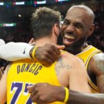 Luka Doncic scores 60, LeBron ties NBA games record in Lakers win