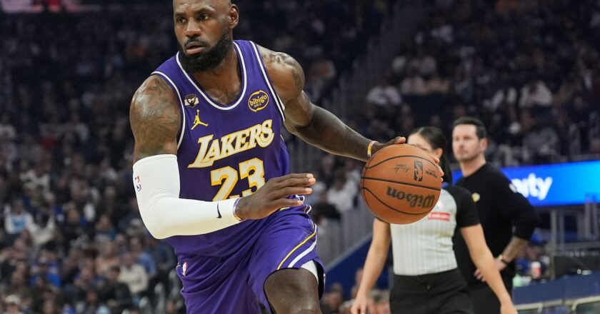 LeBron James has 26 points, 11 assists to lead Lakers past Warriors 119-103 as Stephen Curry sits