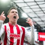 Cologne wins Bundesliga relegation duel 3-1 against 10-man Werder Bremen