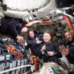 Artemis II astronauts make long-distance call to space station on the way home from the moon