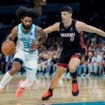 NBA play-in: Coby White 3, late LaMelo Ball layup propel Hornets in OT thriller past Heat