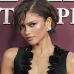 Zendaya poses in semi-sheer lingerie-inspired gown, balancing sophistication with sensuality