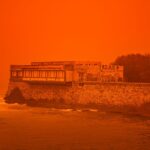 Saharan dust storm turns Greek sky red as winds and flooding leave 1 person dead :: WRAL.com