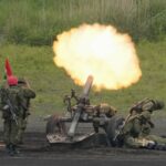 Japan raises tobacco, corporate taxes to finance boost in defense spending